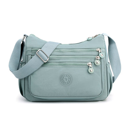 ✨ 50 % RABATT NU! ✨ Lätt nylon crossbody-väska med flera fickor – smidig, säker & perfekt för vardag & resa 🎒