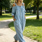 🔥✨ Cold-shoulder jumpsuit med vida ben & fickor – luftig komfort och stilren elegans för sommaren ☀️