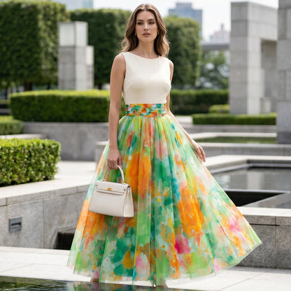 👗🌸 Lätt tyllmidikjol med konstnärligt blommotiv