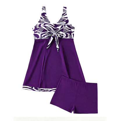 Elegant badklänning för damer med blommönster och inbyggda shorts