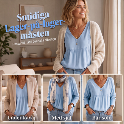 Kvinnlig ledig blus med V-ringning och långa ärmar