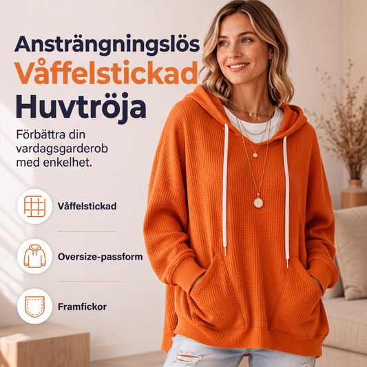 Damernas vaffelstickade luvtröja med lös passform och fickor