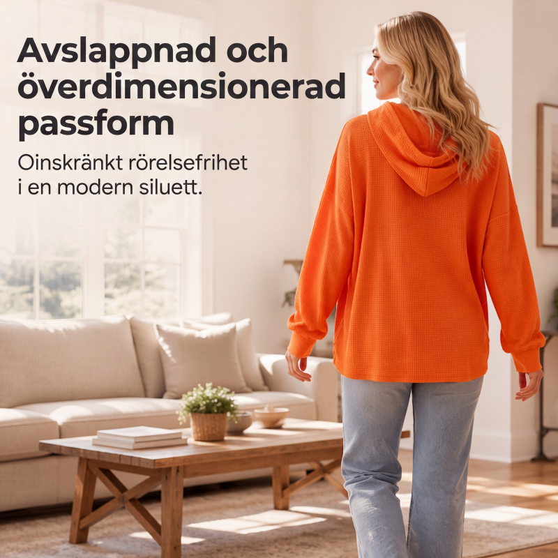 Damernas vaffelstickade luvtröja med lös passform och fickor