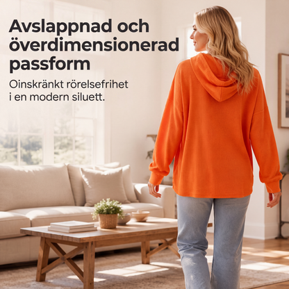 Damernas vaffelstickade luvtröja med lös passform och fickor