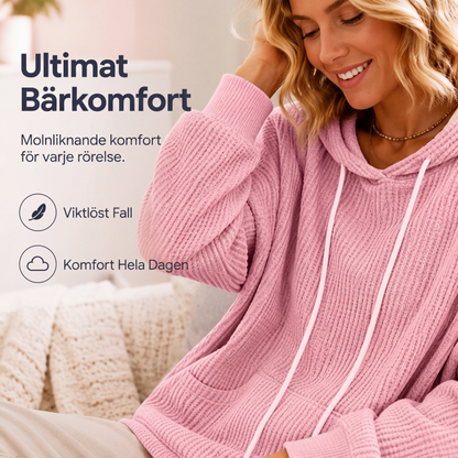 Damernas vaffelstickade luvtröja med lös passform och fickor