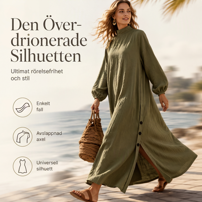 Dam löst sittande långärmad maxiklänning