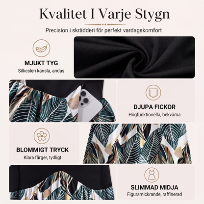 Damklänning med V-ringning och korta ärmar, längd upp till mitten av vaden